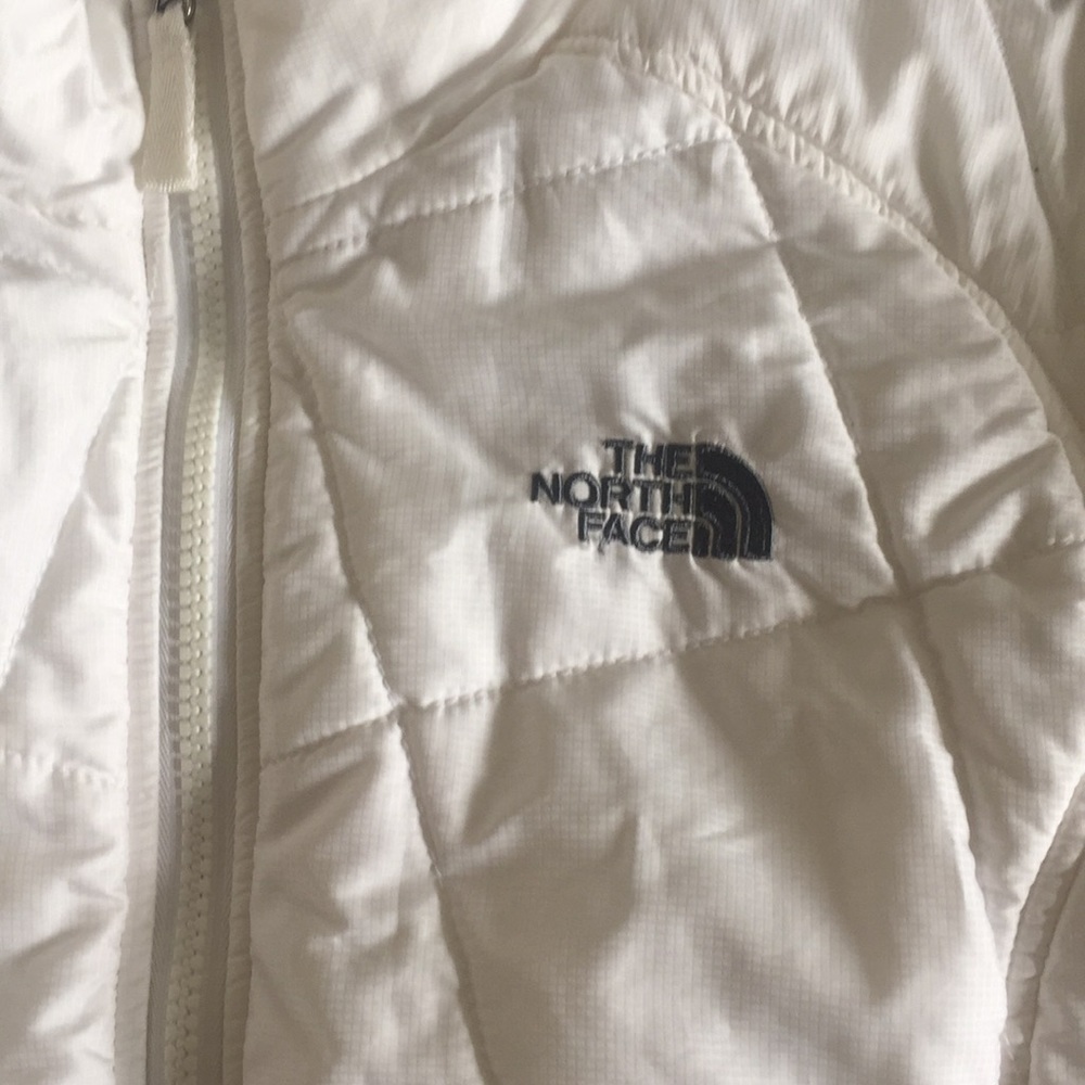 White puffy women’s XS North Face!